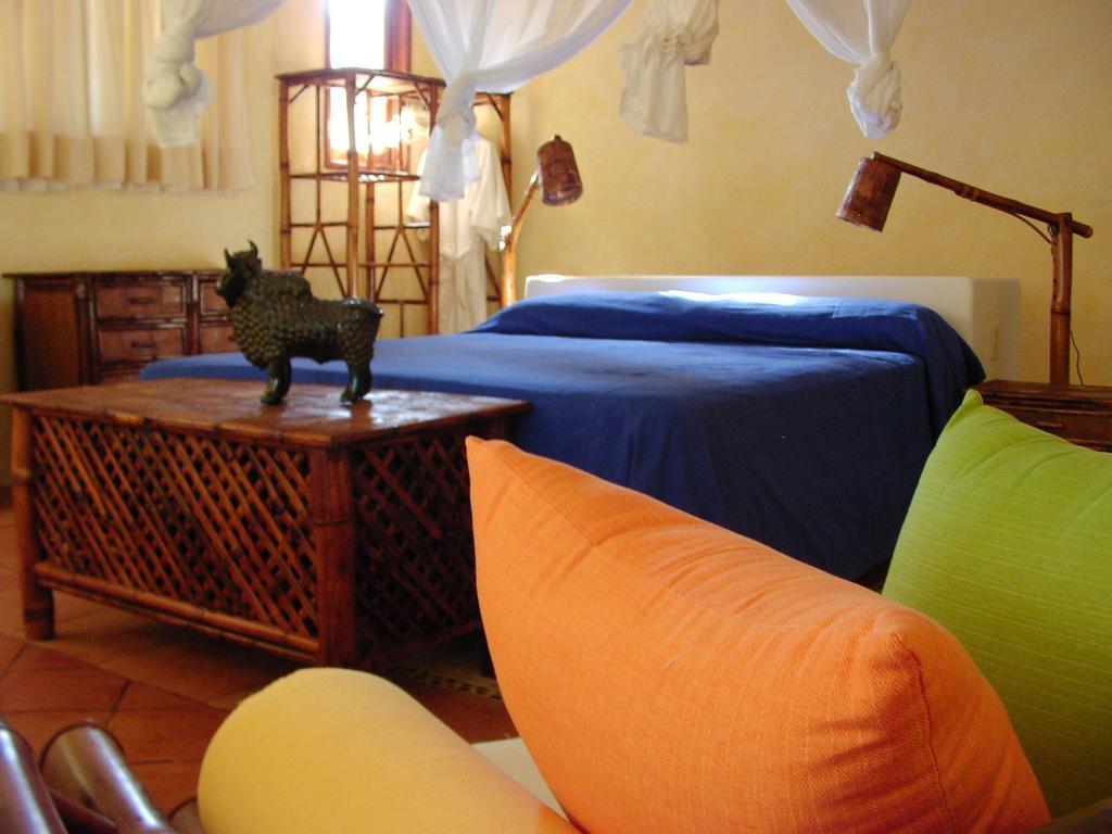 Casa Kaukan Zihuatanejo Szoba fotó